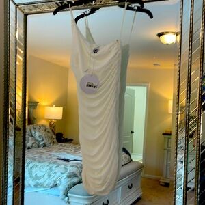 NWT Princess Polly Size 4, length 34.  Ruched white dress.  Fitted. Bridal